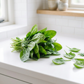 Fresh spinach in a crisp white kitchen setting
